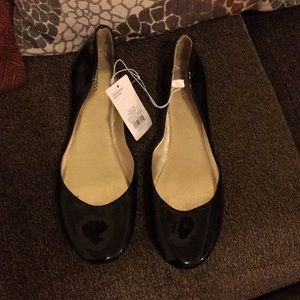 Little black shiny flats